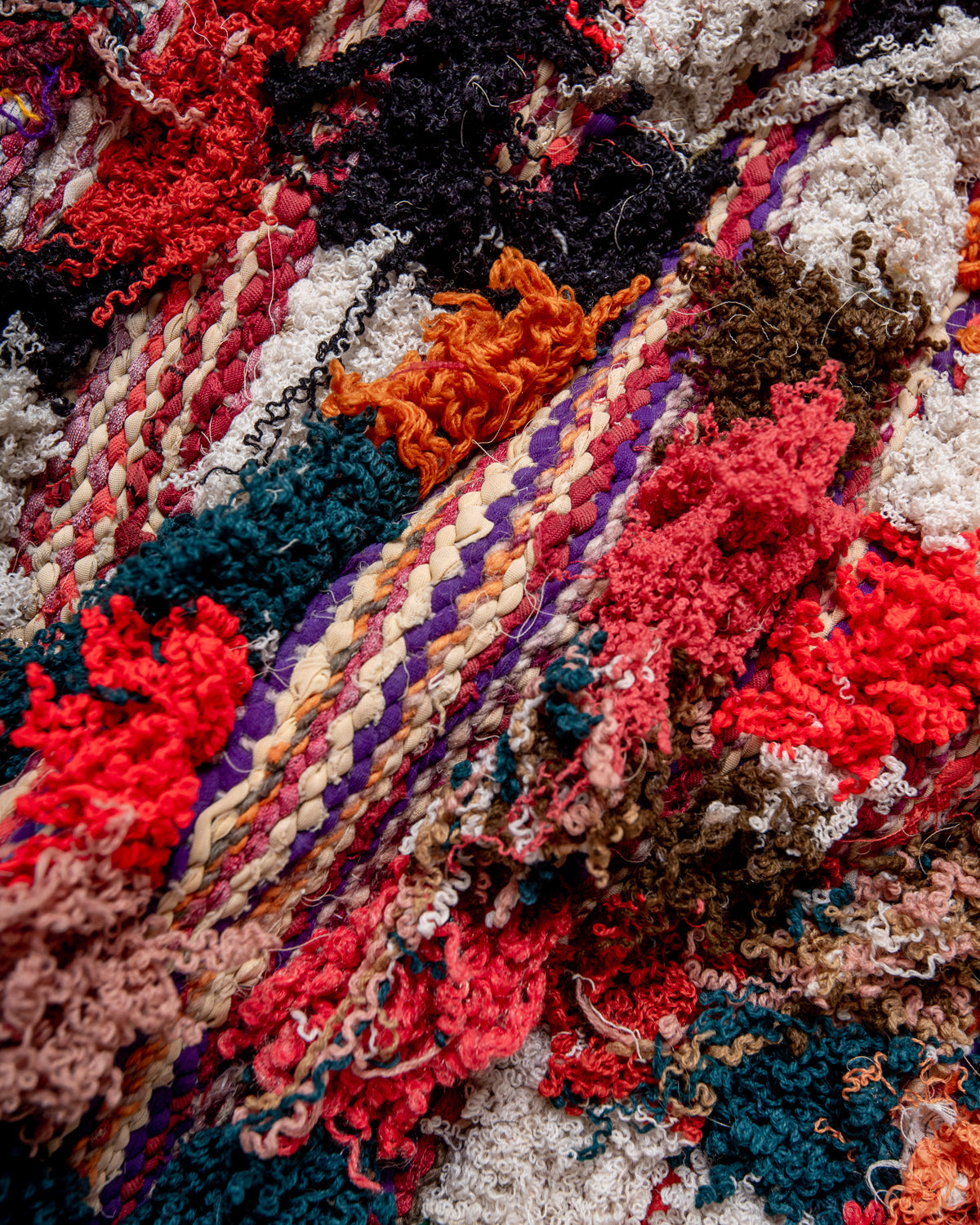 Modern designer vintage handcrafted Berber rug from Morocco. Boucherouite runner rug with beautiful colors and patterns.